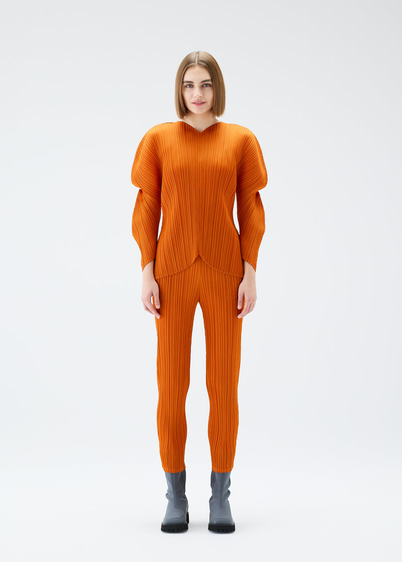 WORMHOLE Trousers Dark Orange